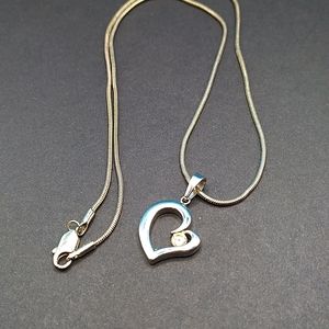 Silver tone heart necklace